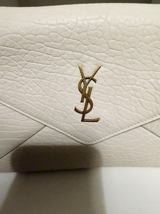 POCHETTE ENVELOPE CASSANDRE GRANDE IN PELLE DI AGNELLO