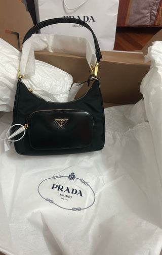 Prada re edition nylon e pelle